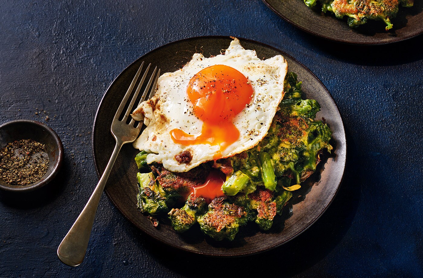 Broccoli fritters with anchovy fried eggs