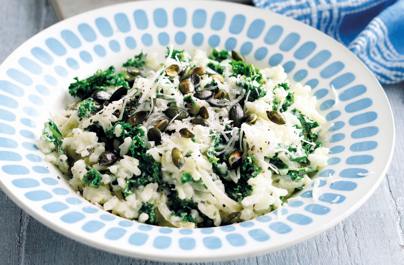 Baked kale risotto with pumpkin seeds