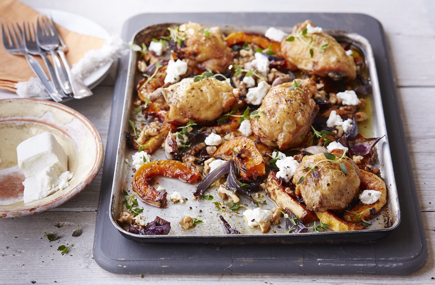 Baked chicken thighs with butternut squash and goat’s cheese