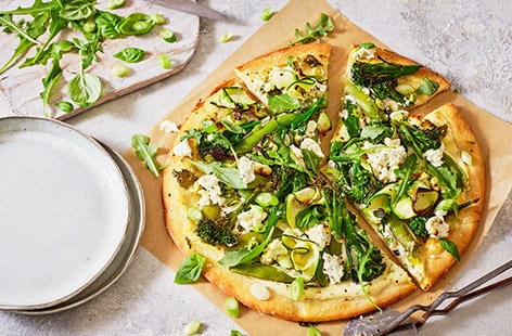 Image of "Cheesy green goddess pizza"