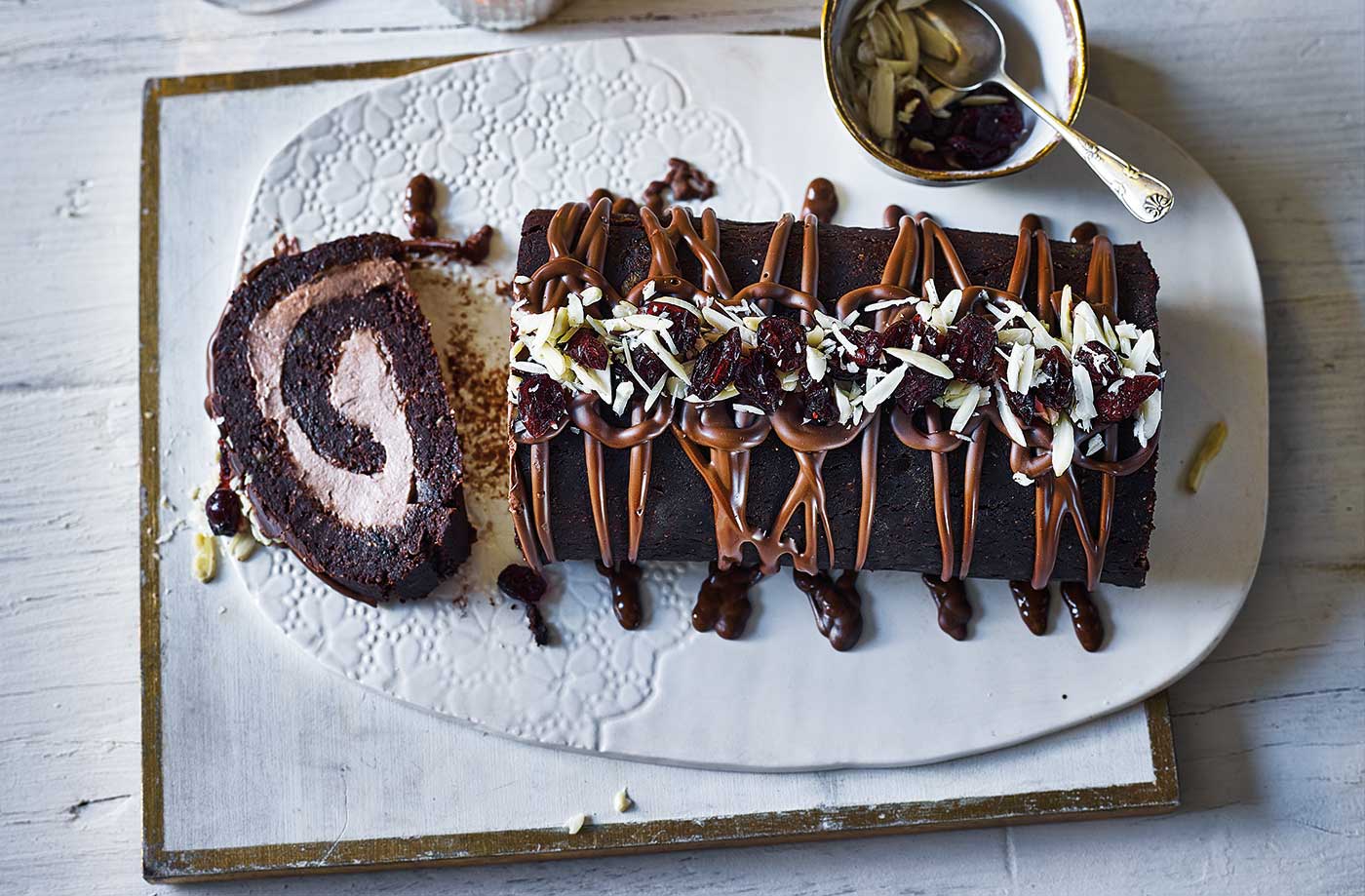 Vegan chocolate and cranberry roulade