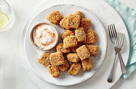 Image of "Crispy paneer with chilli yogurt dip"