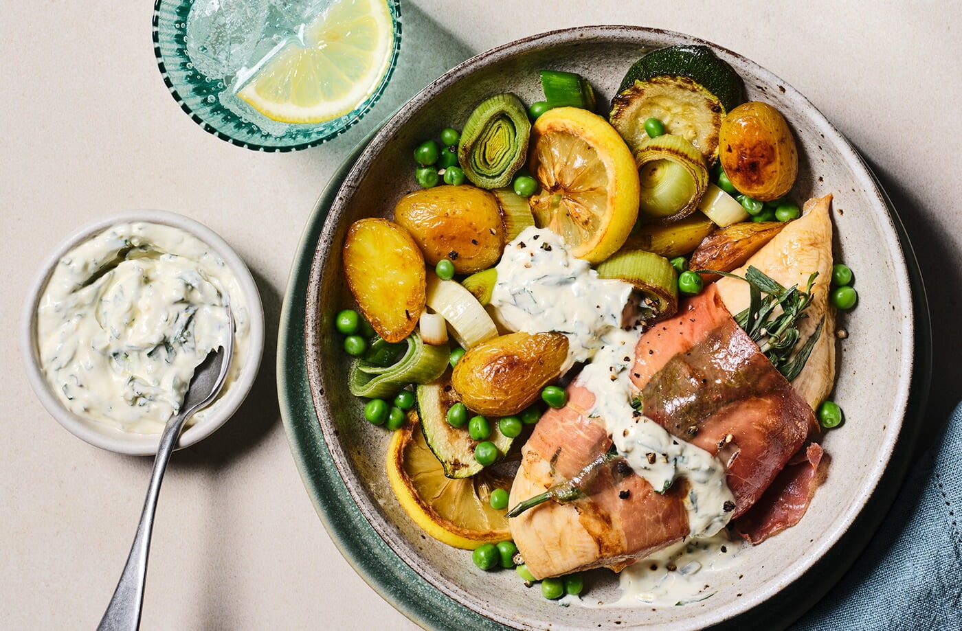 Prosciutto-wrapped chicken with spring veg