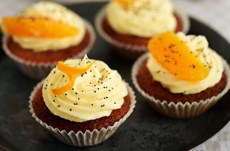 Image of "Orange and poppy seed cupcakes with cream cheese frosting"