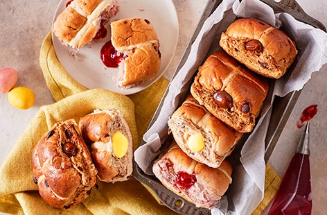 Image of "Hot cross bun filled doughnuts"