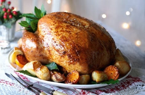 Image of "Roast turkey with date, pancetta and rye bread stuffing"