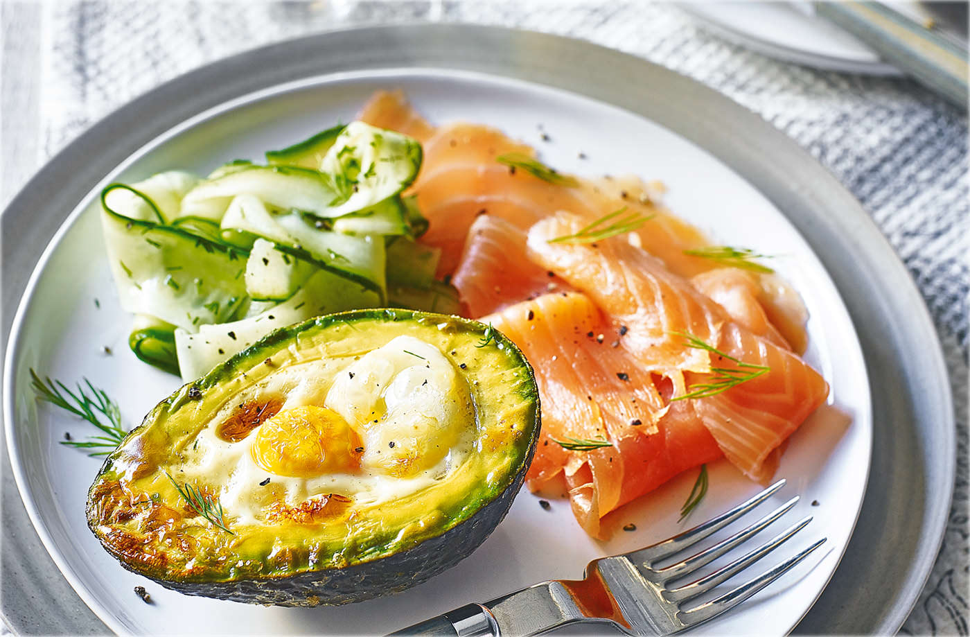 Eggs baked in avocado with smoked salmon
