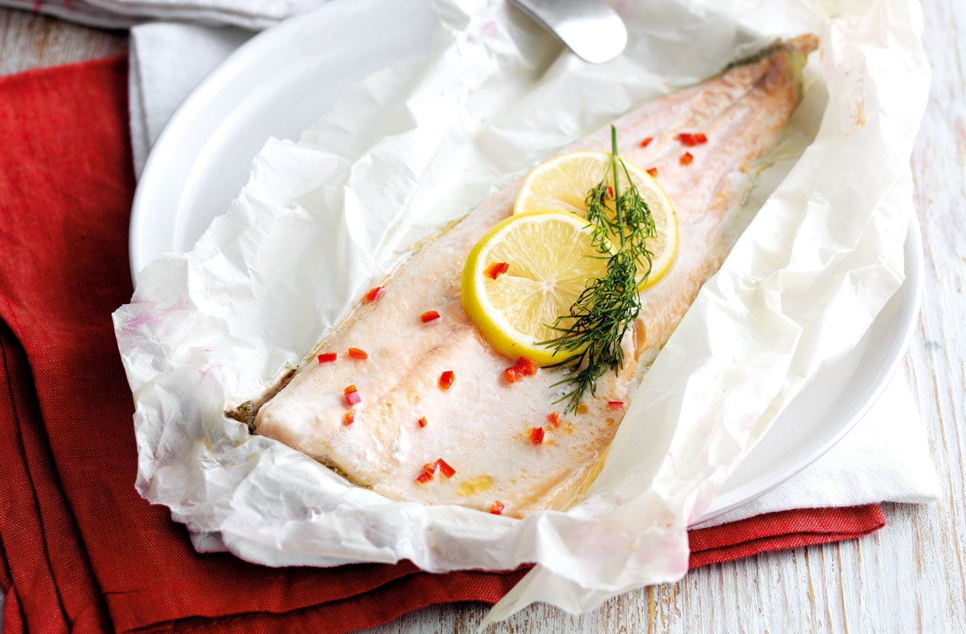Baked fish with walnut, beetroot and wild rice