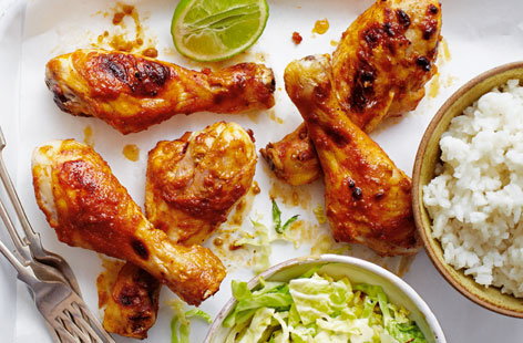 Image of "Peanut chicken drumsticks with rice and cabbage"