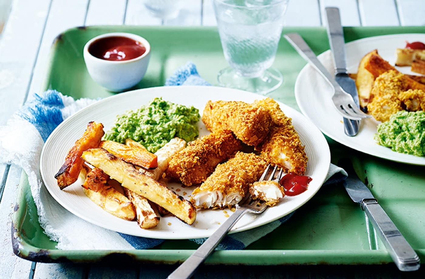 Cheat's fish fingers and rainbow chips