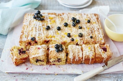 Image of "Iced lemon, coconut and blackcurrant traybake"