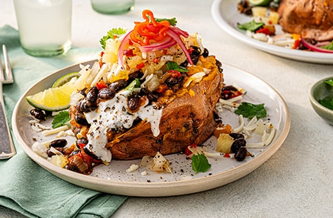 Image of "Demi Singh's sweet potatoes with coconut black beans"