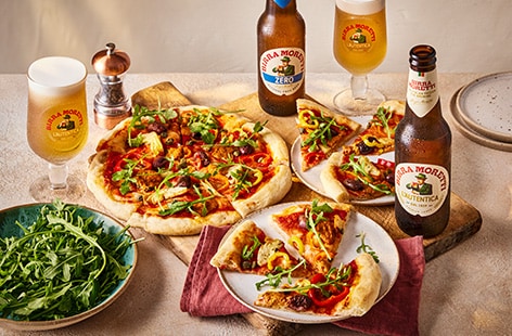 Image of "Vegan pizza with peppers, artichokes and olives"