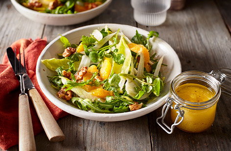 Image of "Bitter leaf salad with olive oil dressing"