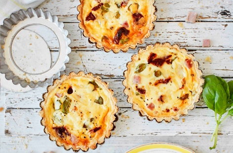 Image of "Mini quiches with ham and sundried tomatoes"