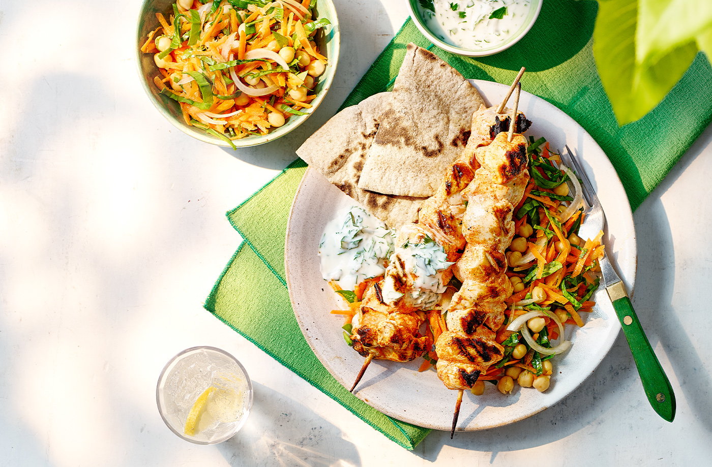 Spiced chicken skewers with chickpea salad