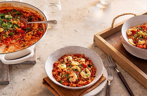 Image of "Tomato-baked rice with king prawns"