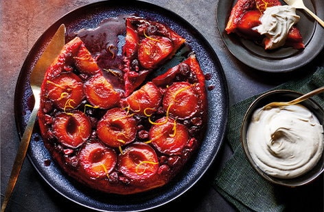 Image of "Plum and cranberry tarte Tatin with brown sugar-whipped cream"