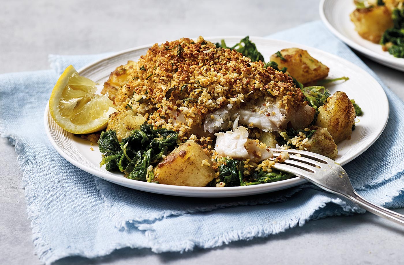 Coconut-crusted fish with saag aloo
