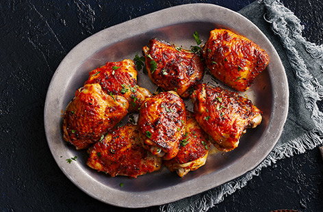 Image of "Sticky honey, garlic and harissa chicken thighs"