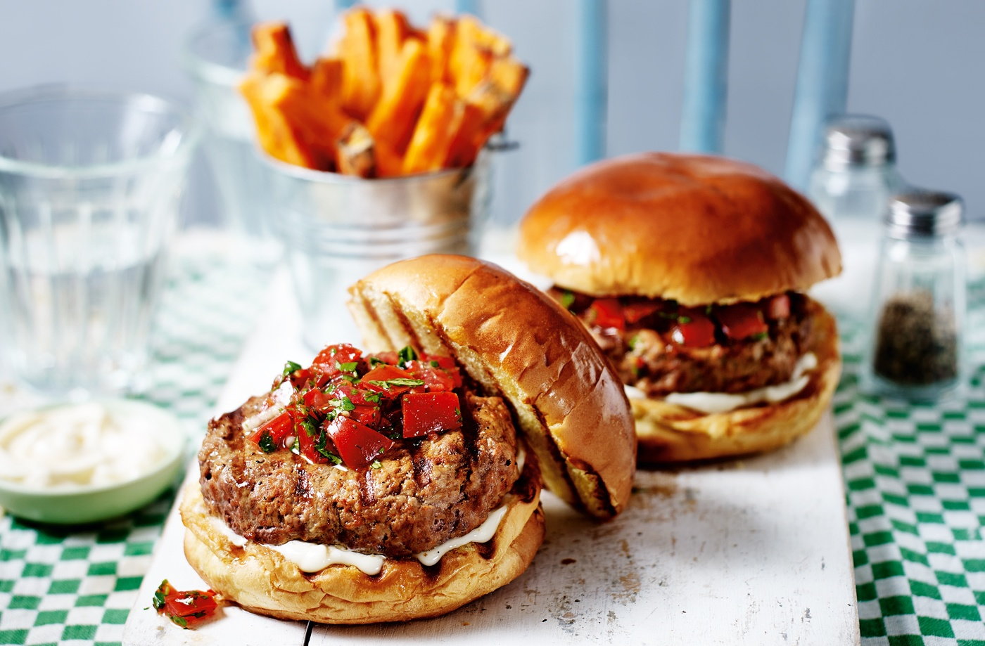 Spicy burgers with salsa and sweet potato fries