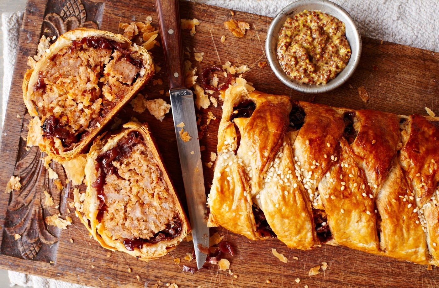 Sausage plait with caramelised onions