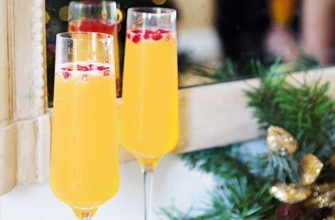 Clementine fizz served with pomegranate seeds