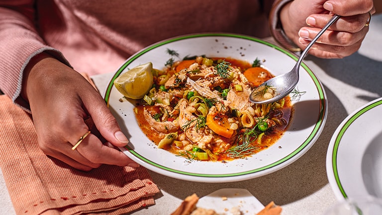 Slow-cooker chicken on brothy grains and veg recipe