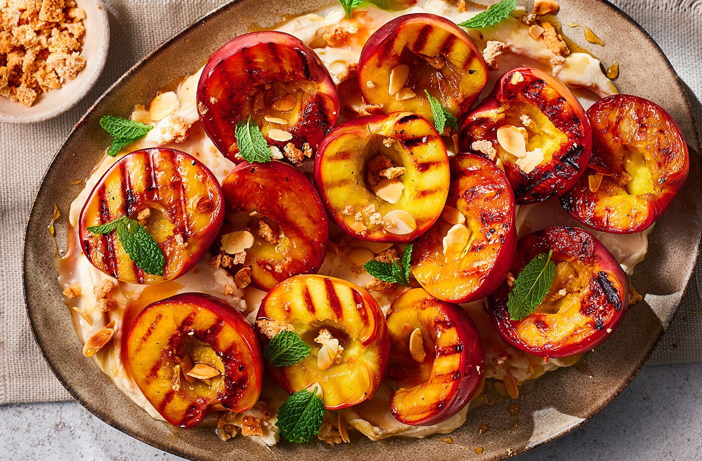 Griddled nectarines with mascarpone and amaretti crumb