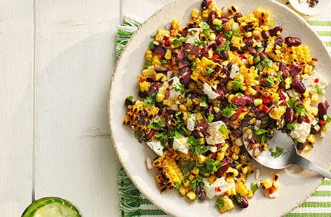 Image of "Charred chilli corn and smoky bean salad with sweet potatoes"