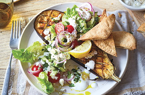 Image of "Aubergine 'steaks' with Greek salad & pitta chips"