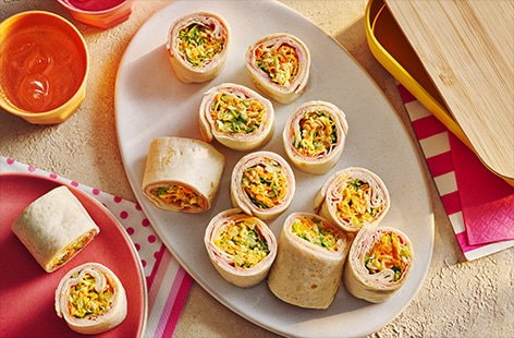 Image of "Ham, cheese & honey mustard “sushi” wraps"