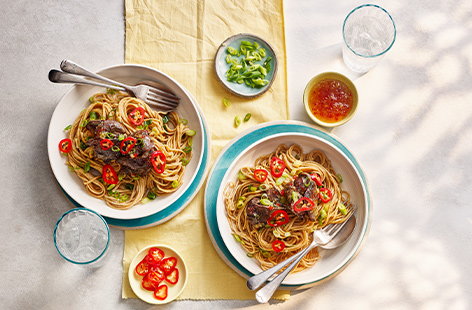 Image of "Crispy chicken livers with spring onion noodles"