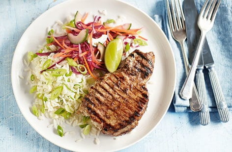 Image of "Jerk pork chops with lime rice and slaw"