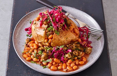 Image of "Jacket potatoes with fennel sausage and beans"