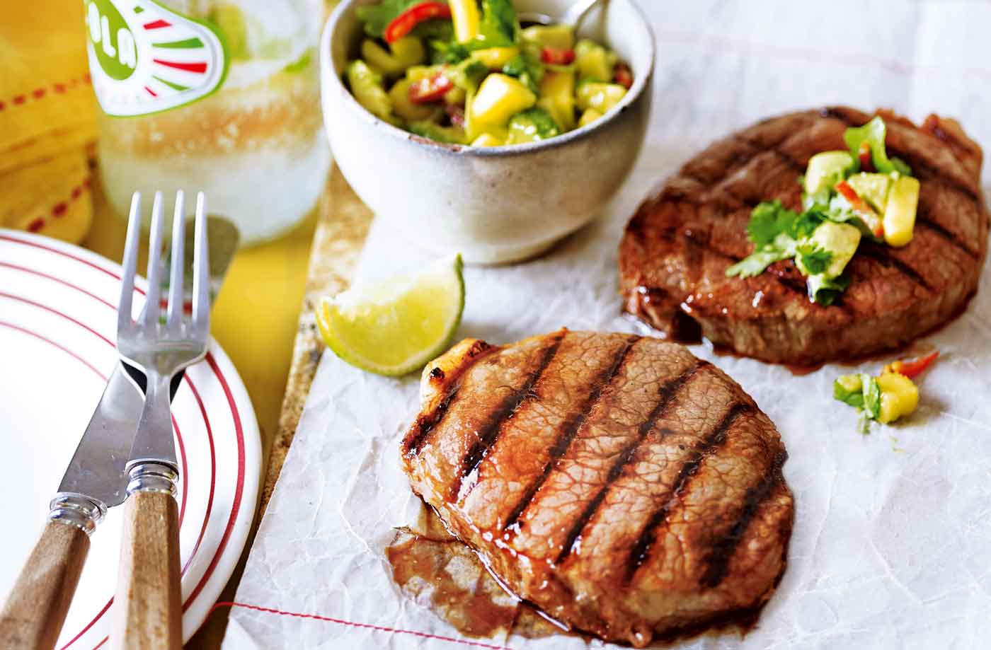 Barbecue steak with lime and mango salsa