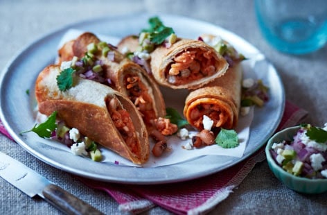 Image of "Spicy rice and bean enchiladas"