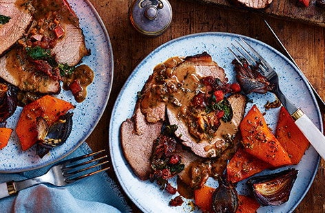 Image of "Chorizo-stuffed beef with roasted garlic sauce"