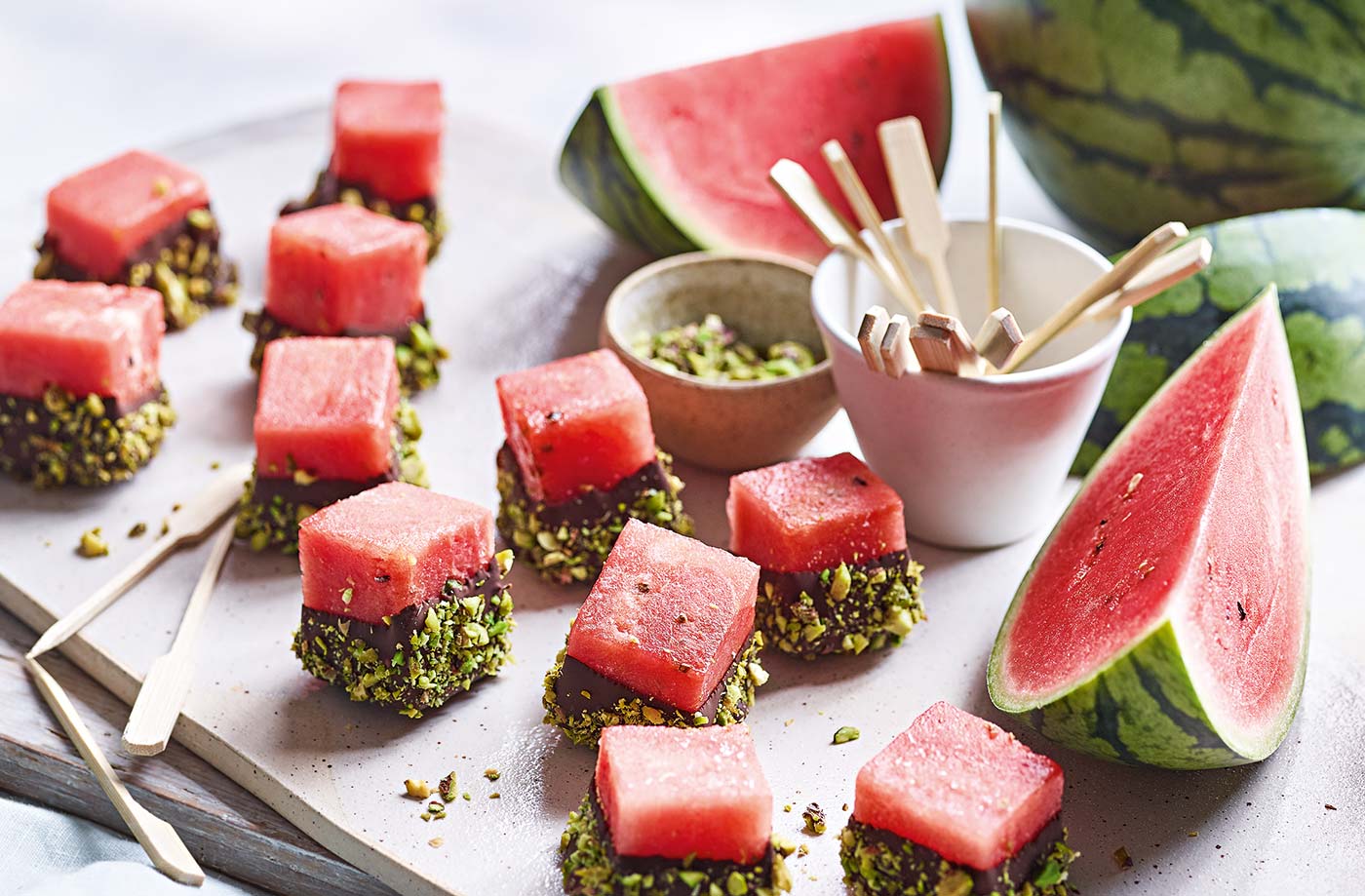 Chocolate-dipped watermelon with crushed pistachios