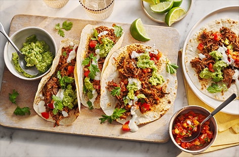 Image of "Slow-cooker shredded beef tacos"
