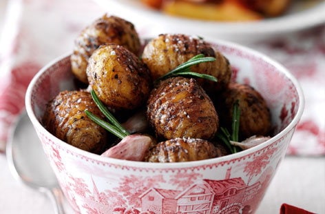 Image of "Hasselback potatoes with roasted garlic and rosemary "