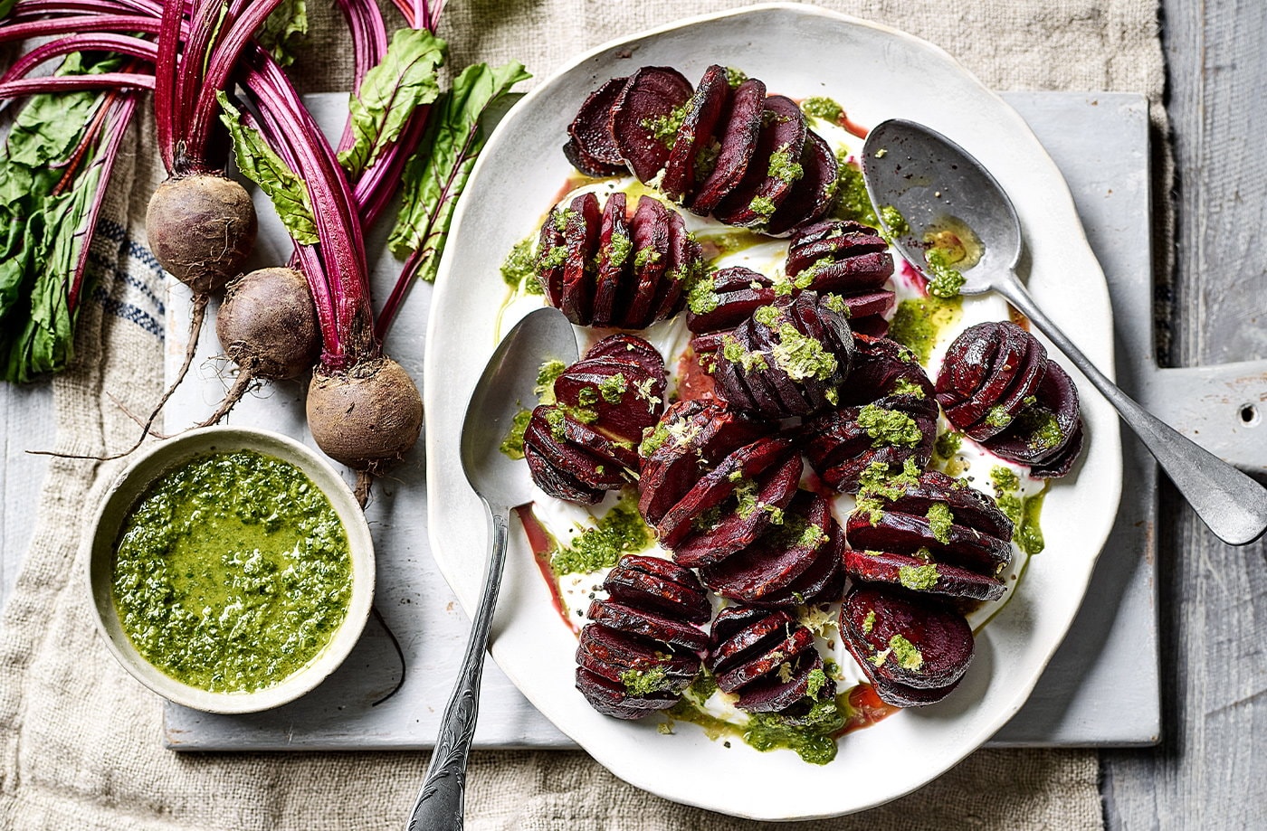 Hasselback beetroot with herby green dressing