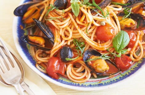 Image of "Spaghetti with mussels, capers, olives and cherry tomatoes"