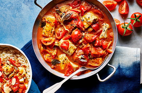 Image of "Tomato and coconut fish curry"