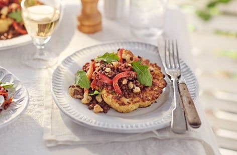 Image of "Roast cauliflower steaks with puy lentil, goat’s cheese and pepper salad"