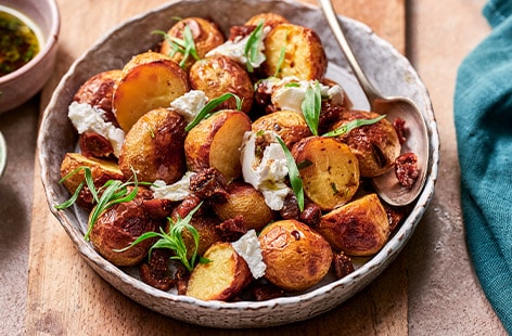 Image of "Roast potatoes with crumbled goat's cheese"