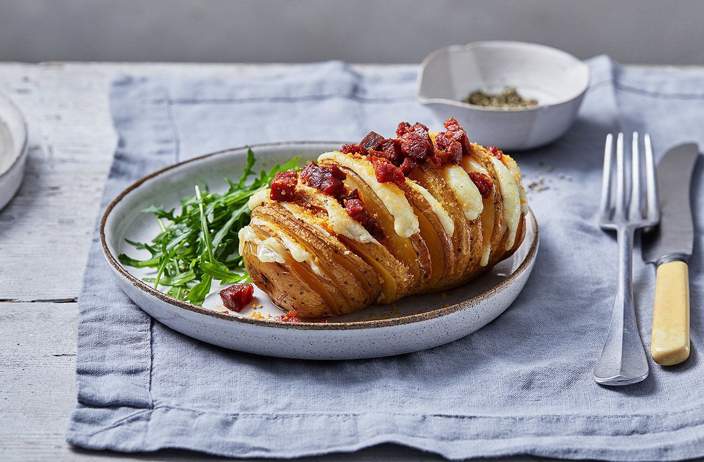 Giant cheesy hasselback potatoes