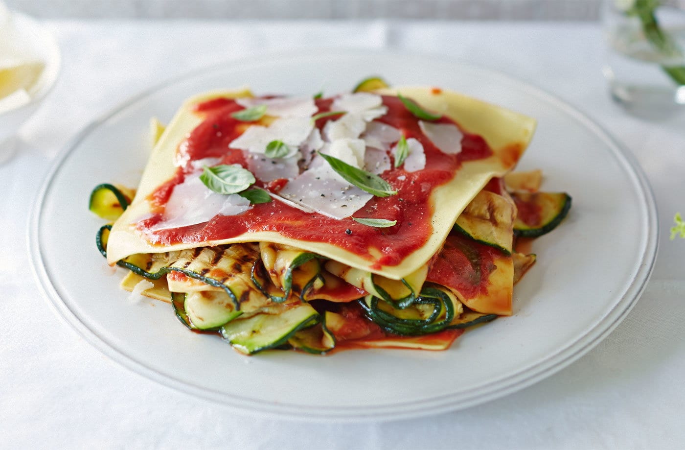 Courgette and tomato open lasagne