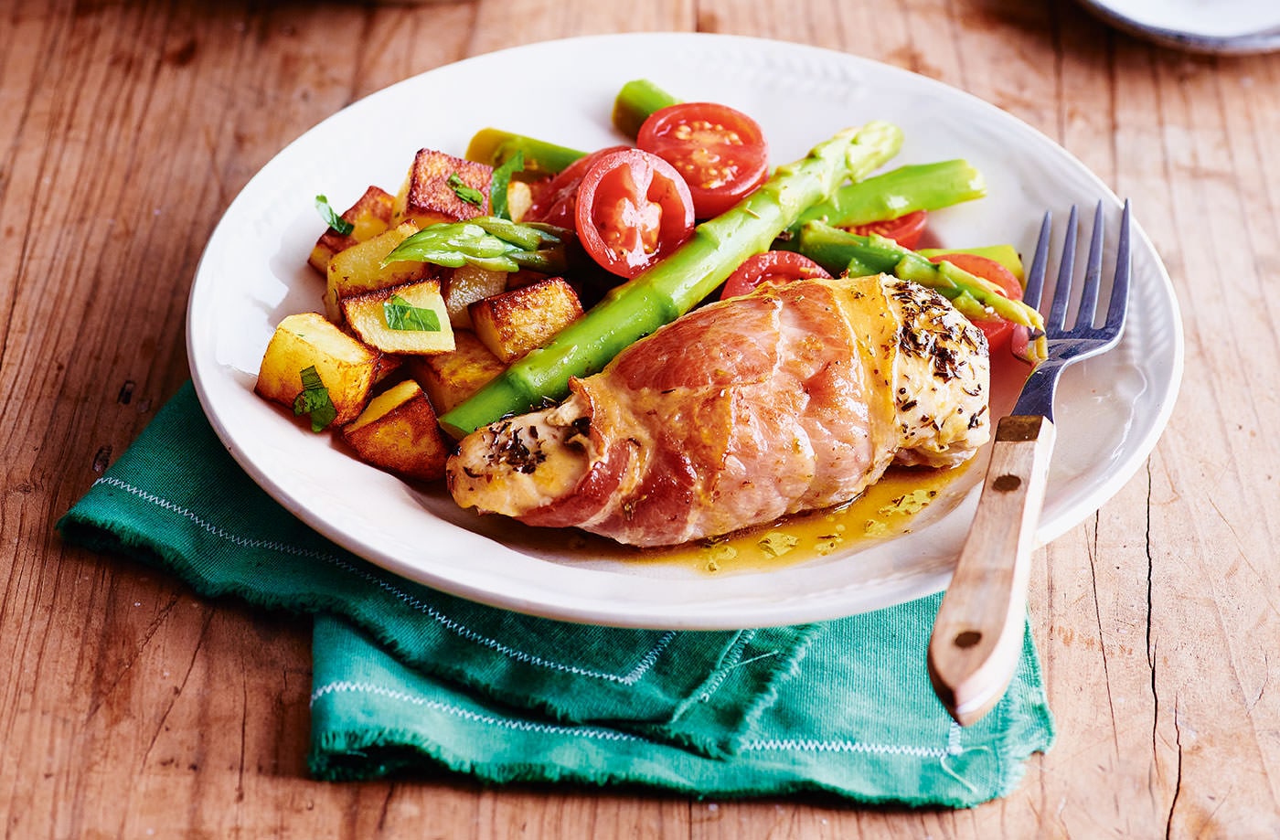 Bacon wrapped chicken with asparagus salad