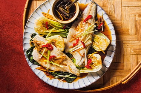 Image of "Crispy ginger and spring onion sea bass"